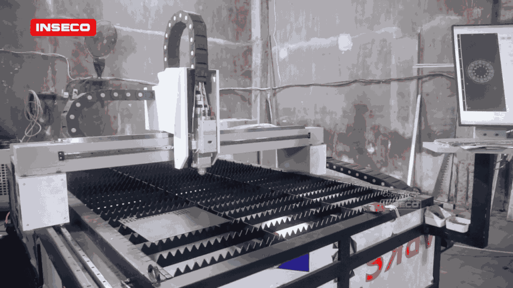 Mesin CNC laser cutting plat INSECO dengan meja kerja luas dan sistem kontrol komputerisasi